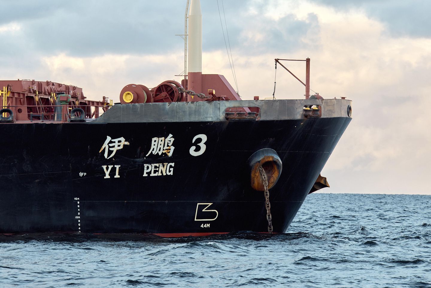 Danish military monitors a Chinese-flagged bulk carrier after undersea data cables were ruptured