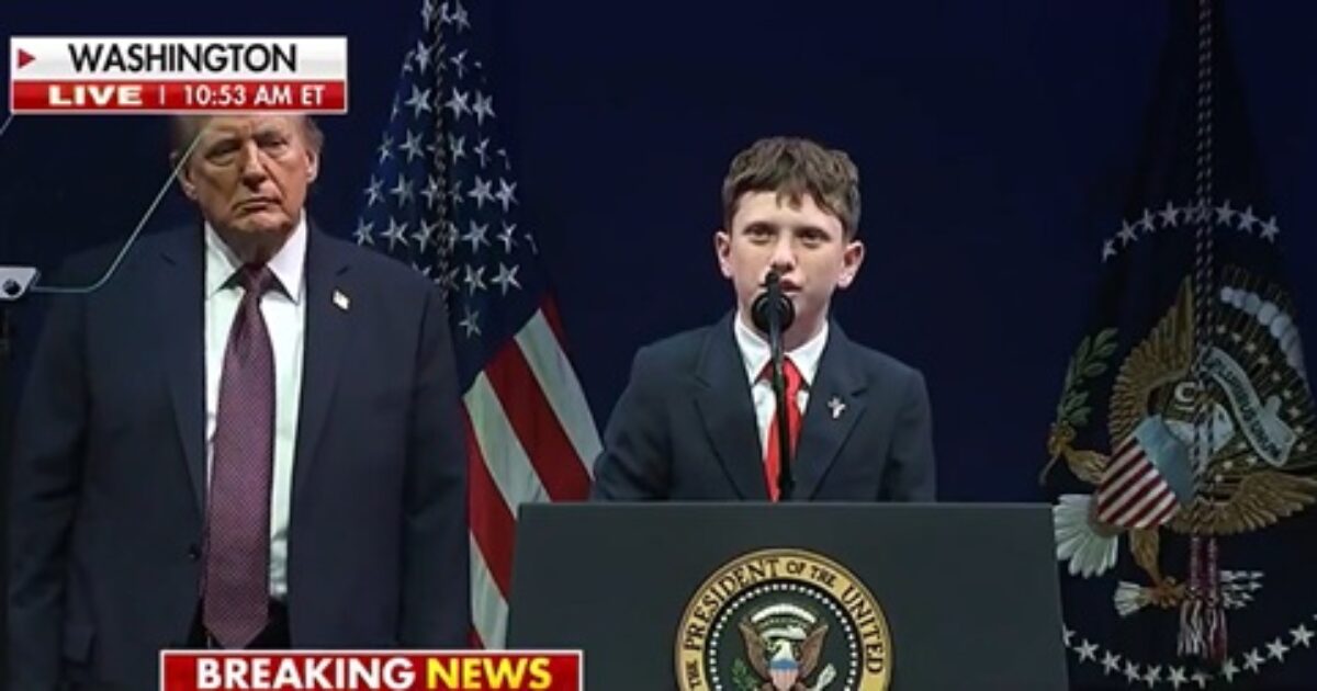 Twelve-yr-old boy stands next to Trump and shares what his school forced him to do
