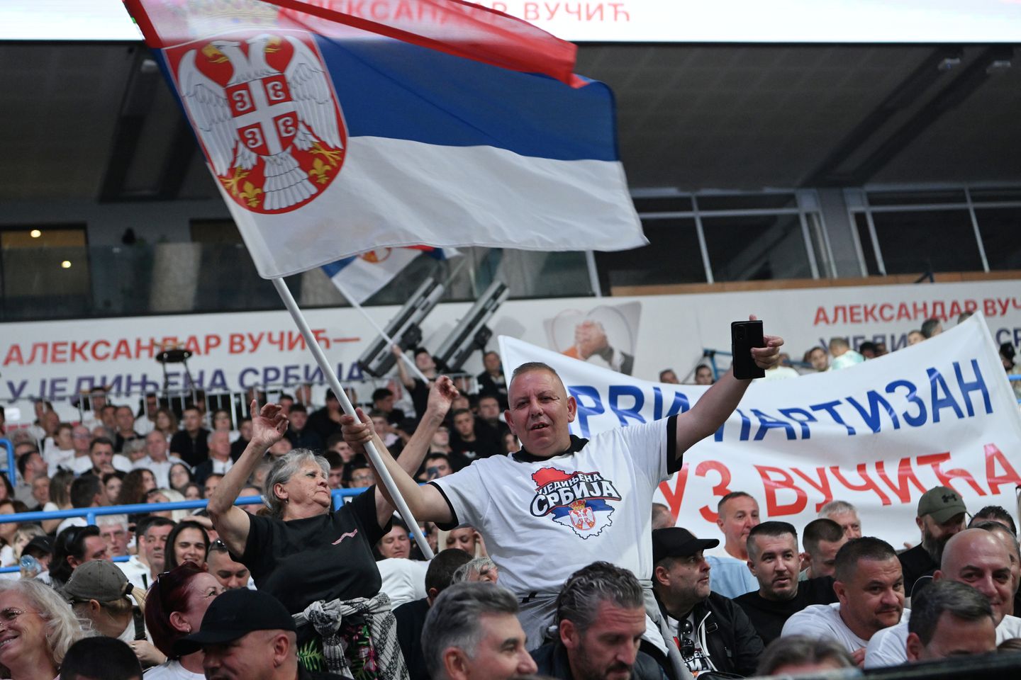 Thousands pack arena in Belgrade as Serbia’s leader Vucic launches prime minister bid
